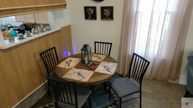 view of carpeted dining space