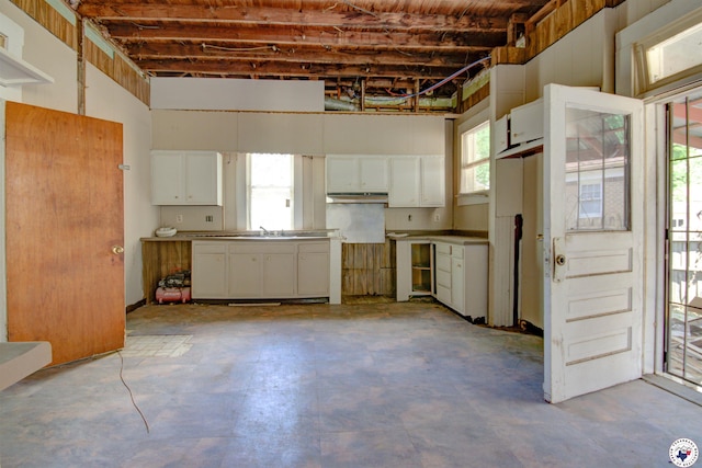 2101 Hazel St, Texarkana, TX 75501 - kitchen featuring white cabinets and concrete flooring