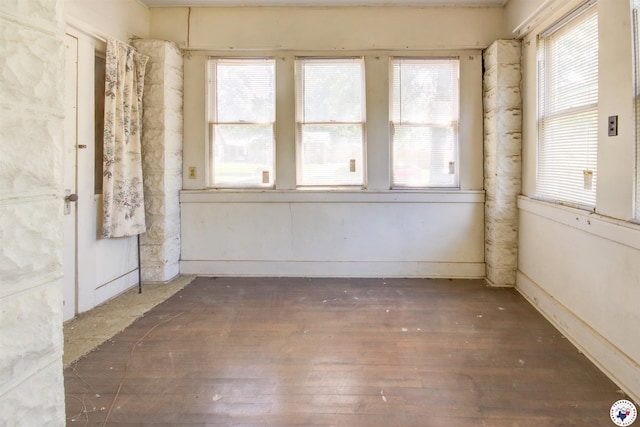 2101 Hazel St, Texarkana, TX 75501 - unfurnished room with plenty of natural light and wood-type flooring