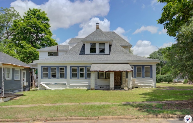 2101 Hazel St, Texarkana, TX 75501 - view of front facade with a front lawn and roof with shingles