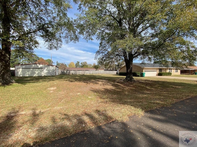 view of yard with a garage