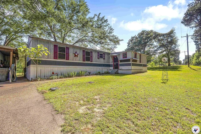 179 Fm 2791, Atlanta, TX 75551 - manufactured / mobile home with a front yard