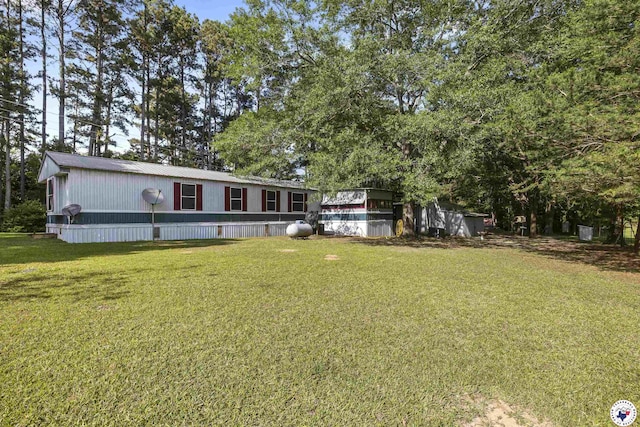 179 Fm 2791, Atlanta, TX 75551 - manufactured / mobile home with a front lawn