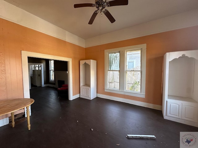 interior space featuring ceiling fan