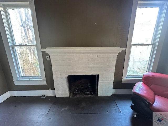 interior space with a fireplace and plenty of natural light