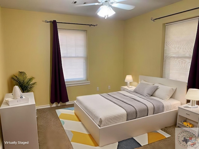 1786 George Thomas Rd, Texarkana, TX 75501 - carpeted bedroom with a ceiling fan and baseboards