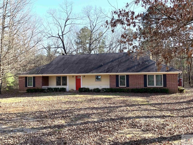 single story home with brick siding