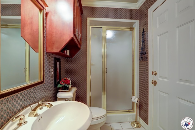 6632 Lakeridge Dr, Texarkana, TX 75503 - bathroom featuring a sink, wallpapered walls, a stall shower, tile patterned floors, and toilet
