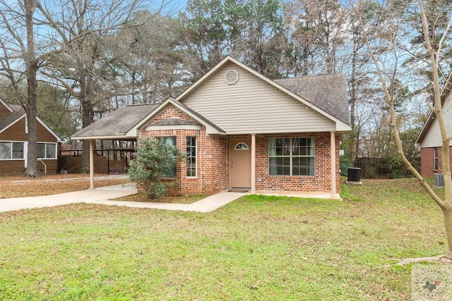 bungalow-style home with a front yard and a carport