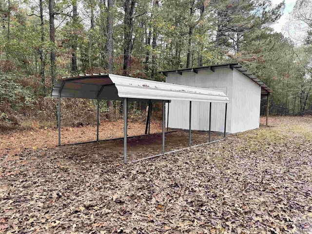 view of outdoor structure with a carport