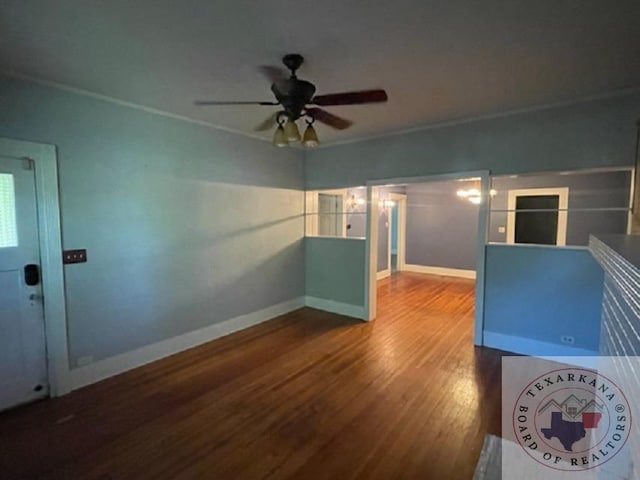 empty room featuring hardwood / wood-style flooring and ceiling fan