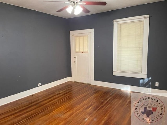 unfurnished room featuring hardwood / wood-style flooring and ceiling fan