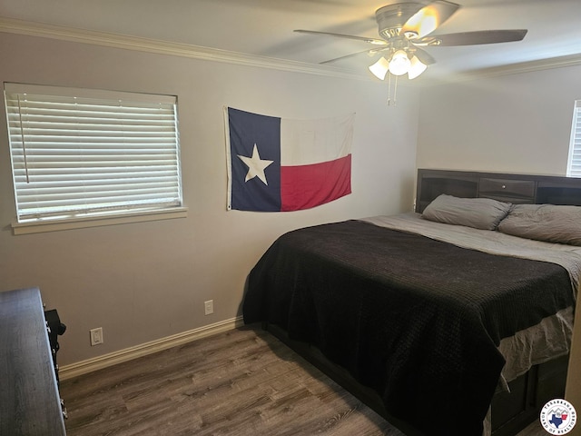 1002 Champion St, Texarkana, TX 75503 - bedroom with wood finished floors, ornamental molding, baseboards, and ceiling fan