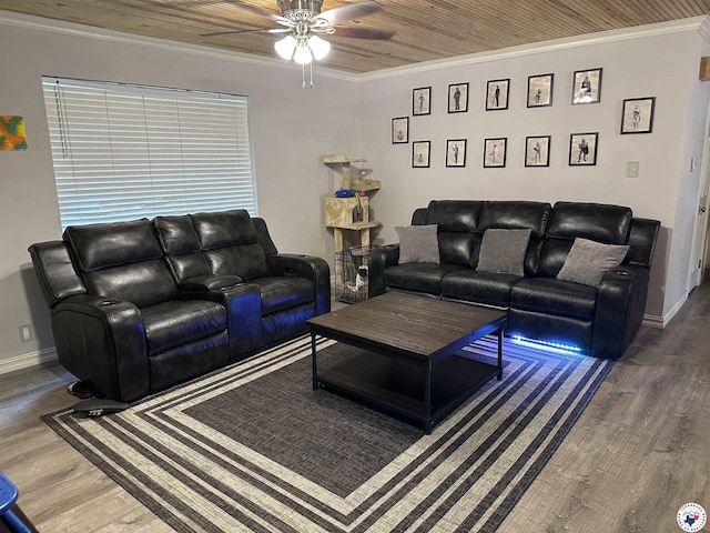 1002 Champion St, Texarkana, TX 75503 - living area featuring a ceiling fan, wood finished floors, baseboards, and ornamental molding
