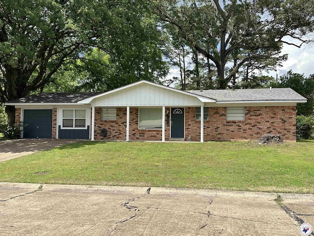 1002 Champion St, Texarkana, TX 75503 - ranch-style house featuring a front yard, brick siding, and driveway