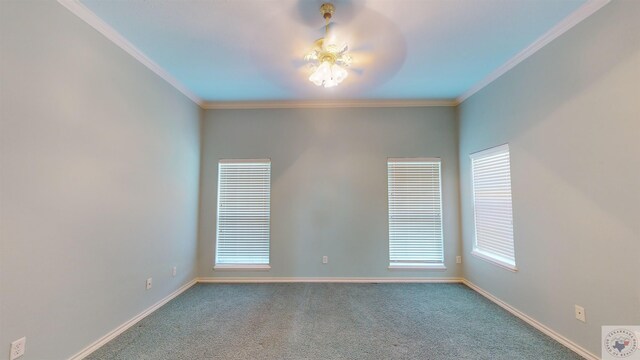 carpeted empty room with ornamental molding