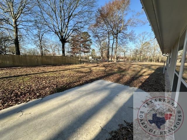 33 Timberlane St, Texarkana, TX 75501 - view of yard featuring fence and a patio