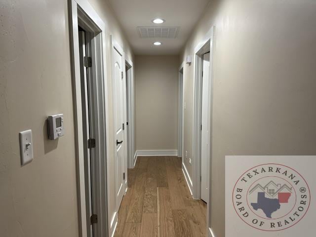 33 Timberlane St, Texarkana, TX 75501 - hall with light wood-style floors, visible vents, baseboards, and recessed lighting
