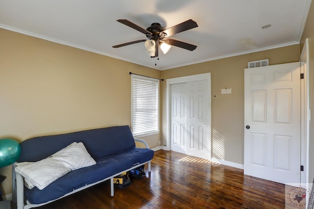 sitting room featuring crown molding, ceiling fan, and dark hardwood / wood-style flooring