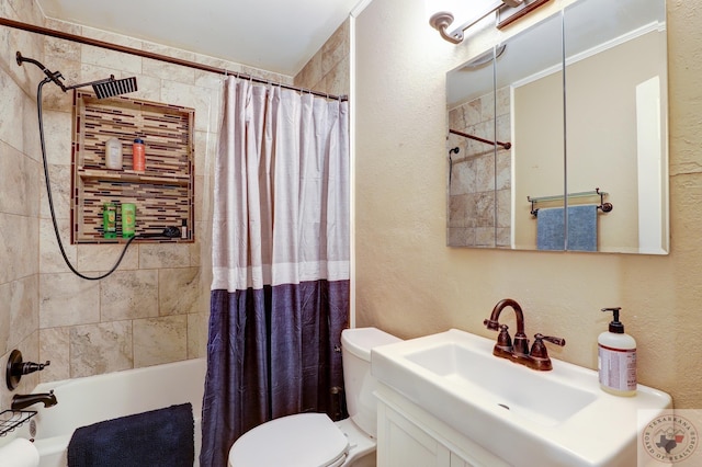 full bathroom featuring shower / tub combo, vanity, and toilet