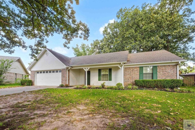 single story home with a garage and a front lawn