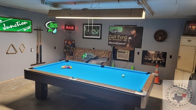 rec room with pool table and concrete flooring