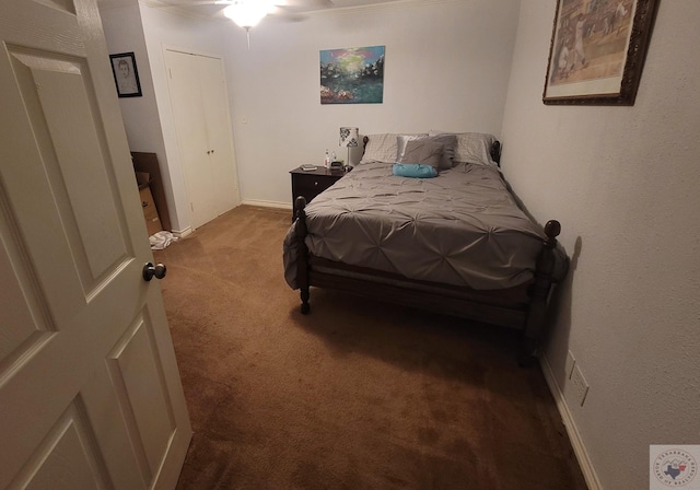 bedroom with ceiling fan and carpet flooring