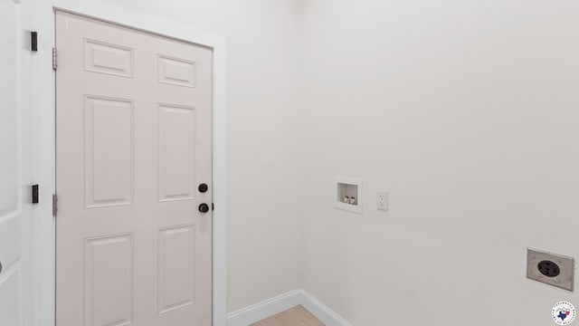 clothes washing area with electric dryer hookup, baseboards, laundry area, and washer hookup