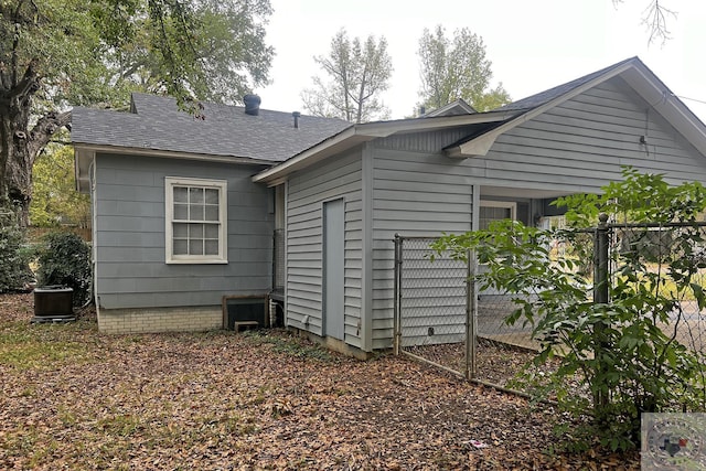 back of house with cooling unit