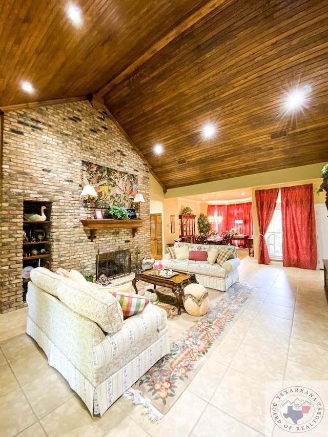 living area with wooden ceiling, tile patterned floors, visible vents, and a brick fireplace