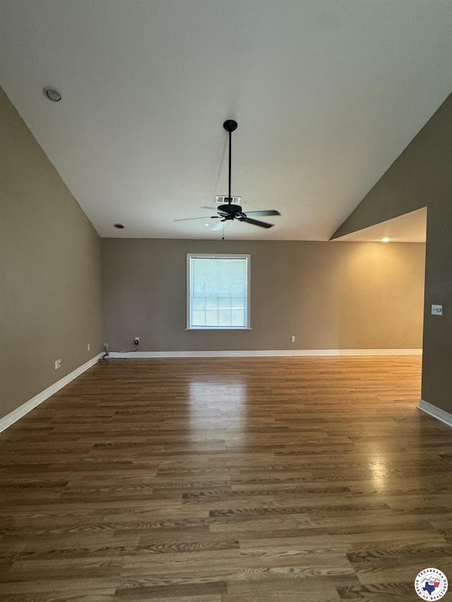 11 Quail Creek Dr, Fouke, AR 71837 - empty room featuring baseboards, ceiling fan, wood finished floors, and lofted ceiling