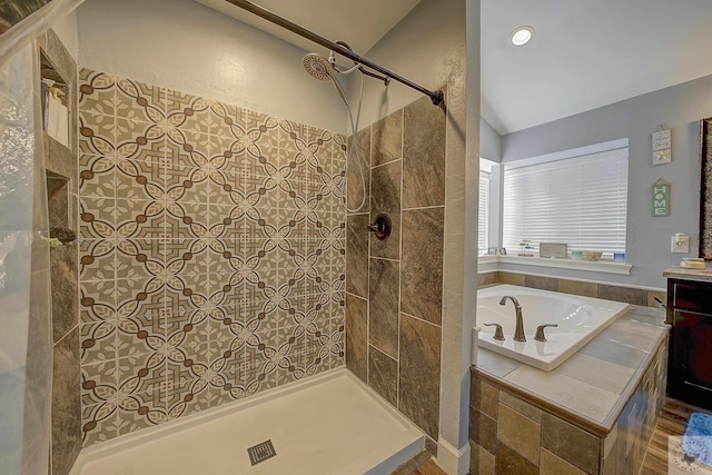 bathroom with separate shower and tub