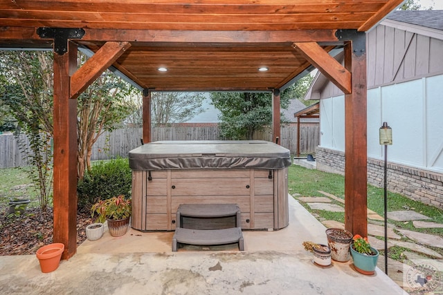 view of patio / terrace featuring a hot tub