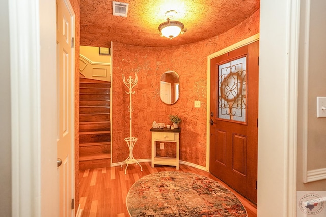 entryway featuring hardwood / wood-style flooring