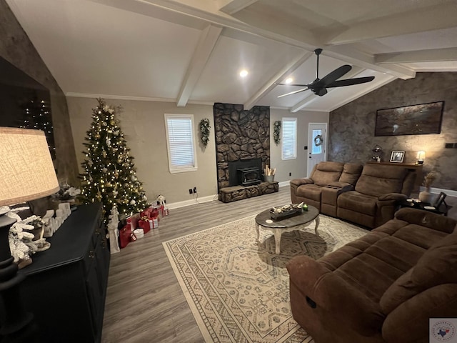 living room with wood-type flooring, lofted ceiling with beams, and ceiling fan