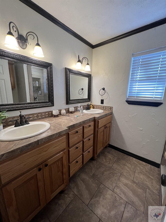 bathroom featuring vanity and ornamental molding