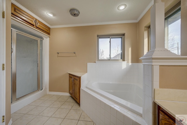 bathroom with tile patterned flooring, vanity, shower with separate bathtub, and ornamental molding