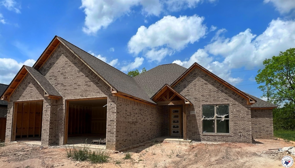 5614 Deaton Pl, Texarkana, TX 75503 - view of front of house with brick siding and a shingled roof