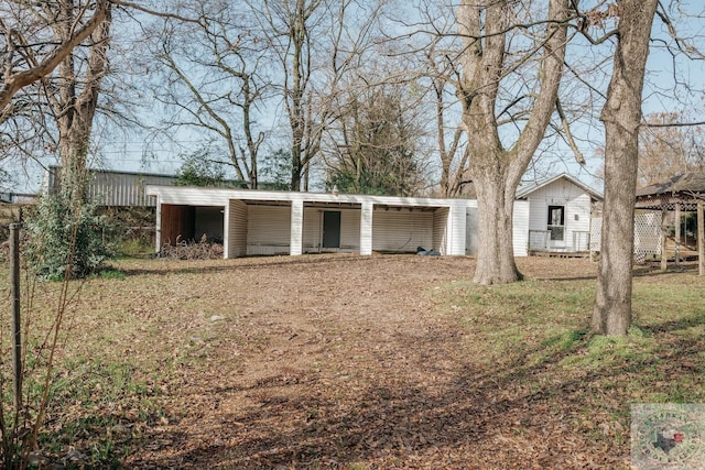 garage with a carport