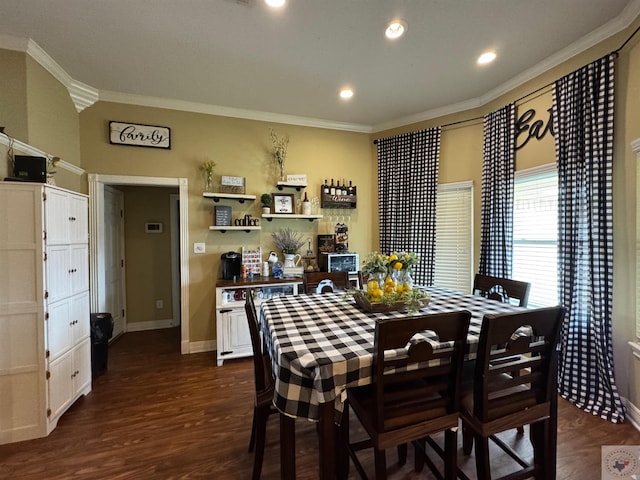 dining space with dark wood-style floors, baseboards, ornamental molding, and recessed lighting