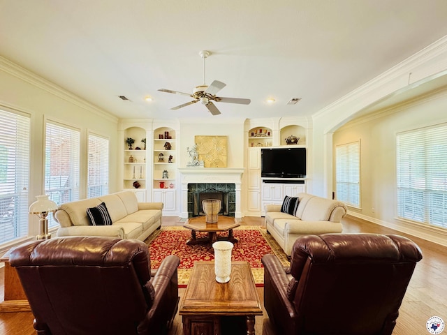 80 Tommy Hines Ln, Texarkana, TX 75501 - living area with a ceiling fan, ornamental molding, built in features, and wood finished floors