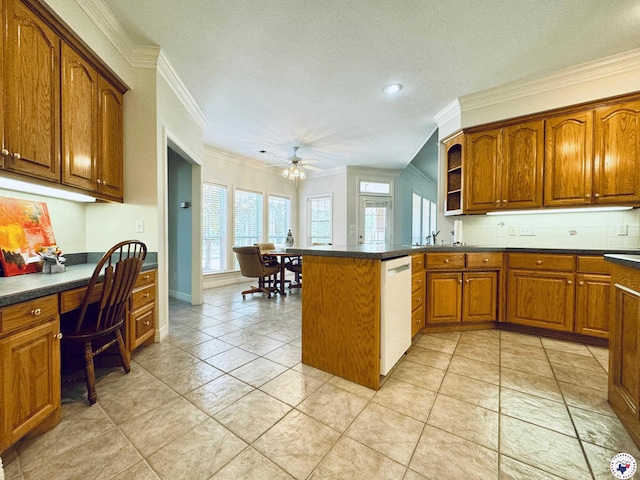 80 Tommy Hines Ln, Texarkana, TX 75501 - kitchen with a peninsula, ornamental molding, dark countertops, and white dishwasher