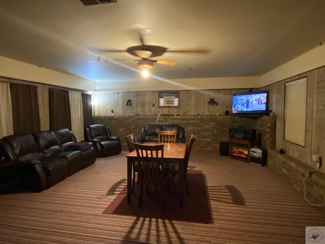 dining area featuring a wall mounted air conditioner