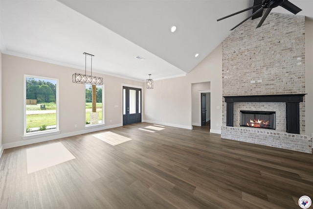8405 Mandarin Cv, Texarkana, TX 75503 - unfurnished living room with ceiling fan, high vaulted ceiling, dark wood finished floors, and baseboards