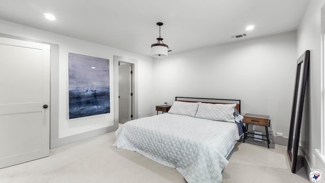 bedroom with recessed lighting, visible vents, baseboards, and light carpet