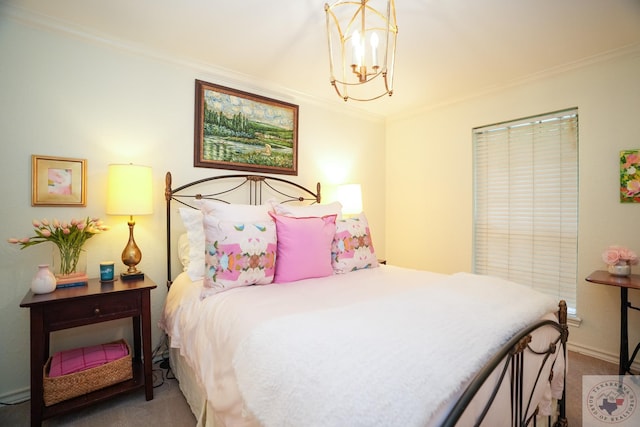 bedroom featuring an inviting chandelier, ornamental molding, and carpet floors