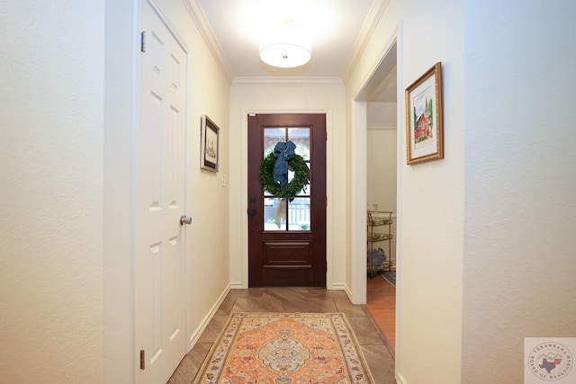 entryway featuring crown molding