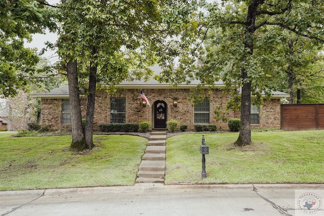 view of front facade with a front lawn