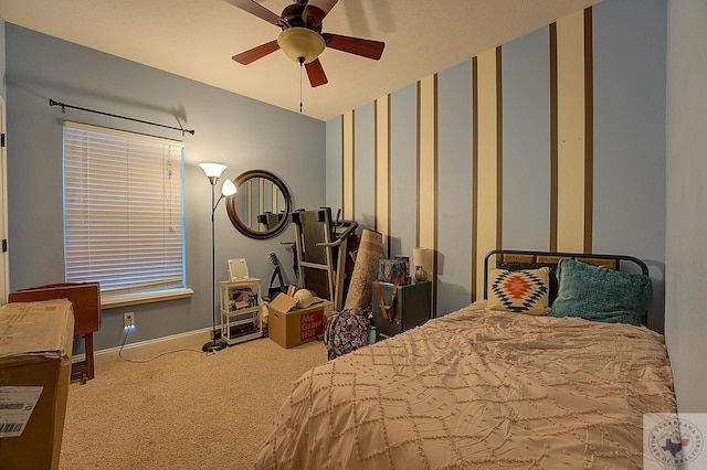 bedroom with ceiling fan and carpet flooring