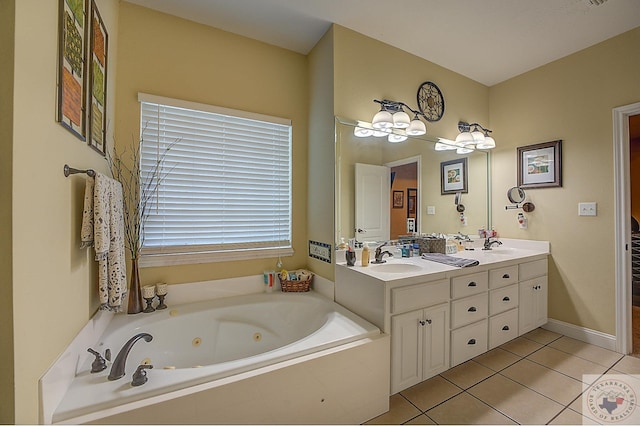 bathroom featuring vanity, a relaxing tiled tub, and tile patterned flooring